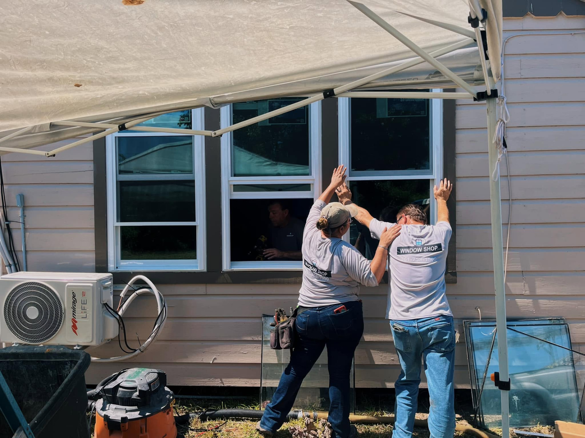 Window Shop crew installing a new window